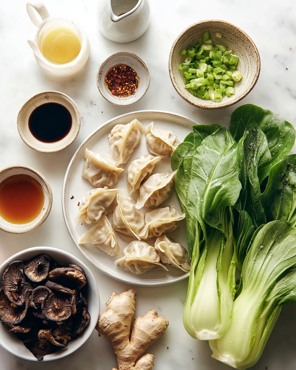 The image shows a white round plate filled with several light beige dumplings, their thin, slightly translucent wrappers crimped at the edges, piled neatly in the center. To the right of the plate, there are two fresh bok choy vegetables with vibrant green leaves covered in small water droplets, and pale green stalks. Above the dumplings, there is a rustic ceramic bowl filled with bright green chopped scallions. In the lower left corner, a white bowl holds dark brown shiitake mushrooms with a wrinkled texture. Scattered around the main items are small dishes and a pitcher containing sauces and ingredients: a bowl with a black liquid, a bowl with light brown liquid, a bowl with an oil-like substance dotted with black pepper, and a small round dish with a reddish-brown sauce. Additionally, there are pieces of fresh ginger and garlic cloves on a white marble surface beneath everything. photo taken with an iphone --ar 4:5 --v 7