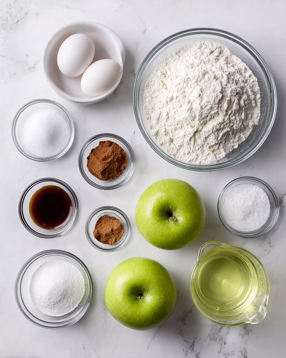 The image shows a top-down view of baking ingredients arranged neatly on a white marbled surface. There are two whole green apples in the middle bottom part of the image. Above them is a large clear glass bowl filled with white flour. To the left, two white eggs sit in a small clear bowl, and below that is a bowl with white granulated sugar. A small bowl with dark vanilla extract is placed below the sugar. On the right side, there are four small clear bowls: one with a brown spice (likely cinnamon), one with white powder (salt), one with another white powder (possibly baking powder), and a third bowl with a different white powder (likely baking soda). On the far right, there is a clear glass measuring cup filled with a light yellow liquid, probably oil. The whole setting gives a clean and organized look focused on baking preparation. photo taken with an iphone --ar 4:5 --v 7
