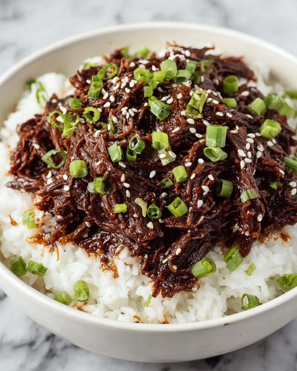 A white bowl is filled with a base layer of fluffy white rice. On top of the rice is a thick layer of dark brown shredded meat in sauce, which looks tender and rich. The meat is sprinkled with small white sesame seeds and chopped green onions, adding texture and bright green color. The background surface is white marble, creating a clean and fresh look. photo taken with an iphone --ar 4:5 --v 7