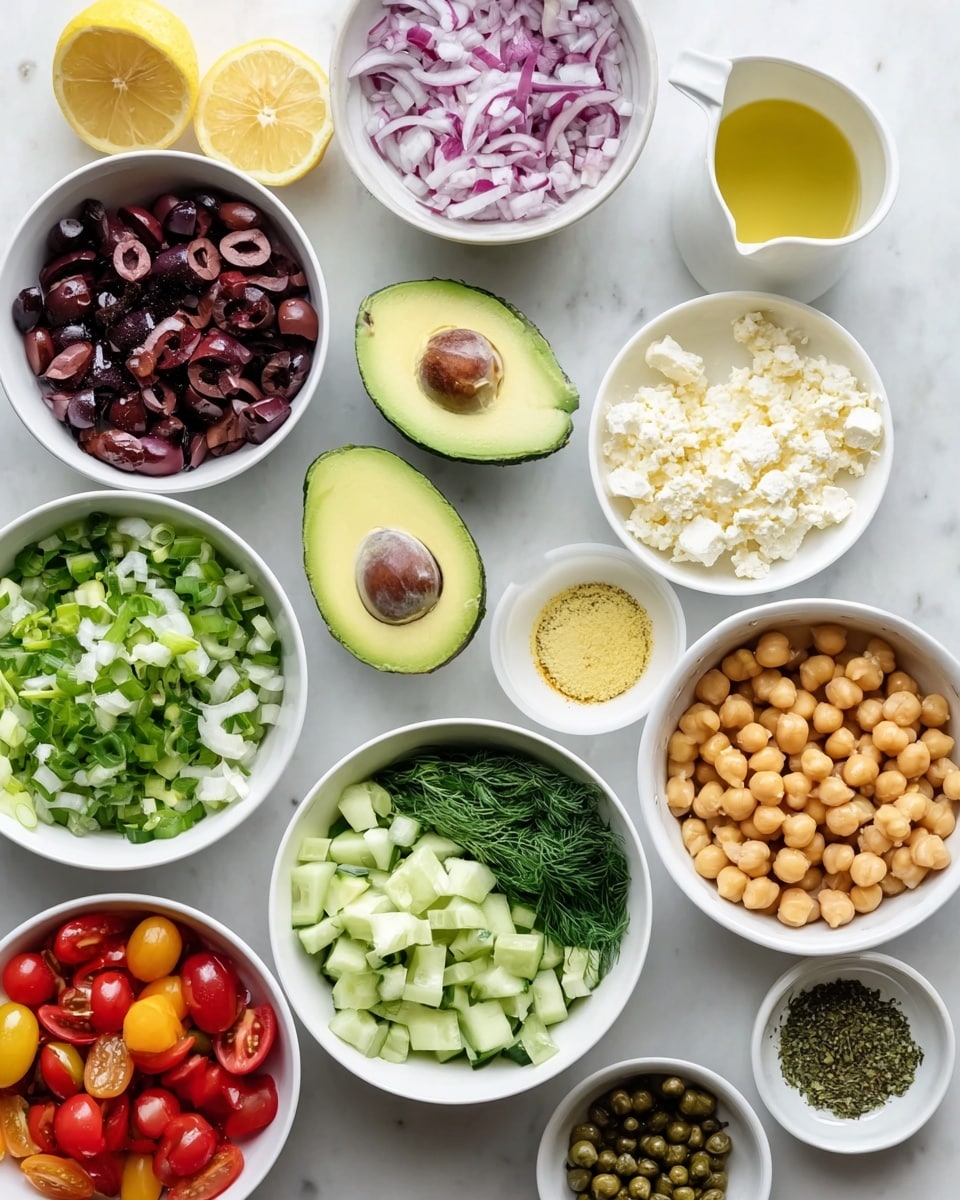 The image shows many small white bowls and plates arranged on a white marbled surface, each holding fresh ingredients for a salad. There are two halves of a bright green avocado in the center, one with the pit inside and one without. Surrounding it, there are layers of diced dark purple kalamata olives, chopped green onions, bright red and yellow cherry tomatoes cut in half, creamy white crumbled cheese, pale green chopped cucumber cubes, fresh dark green dill leaves, and golden chickpeas in a bowl with a white rim. Smaller white dishes hold minced garlic, yellow mustard, mixed dried herbs and spices, and green capers. Two white bowls at the top right corner hold a light golden liquid, one with a narrow spout and the other in a small cup. There is also a lemon half with a vibrant yellow color near the top left. The overall look is clean, fresh, and colorful, with every ingredient clearly seen and separated in its own container. Photo taken with an iphone --ar 4:5 --v 7