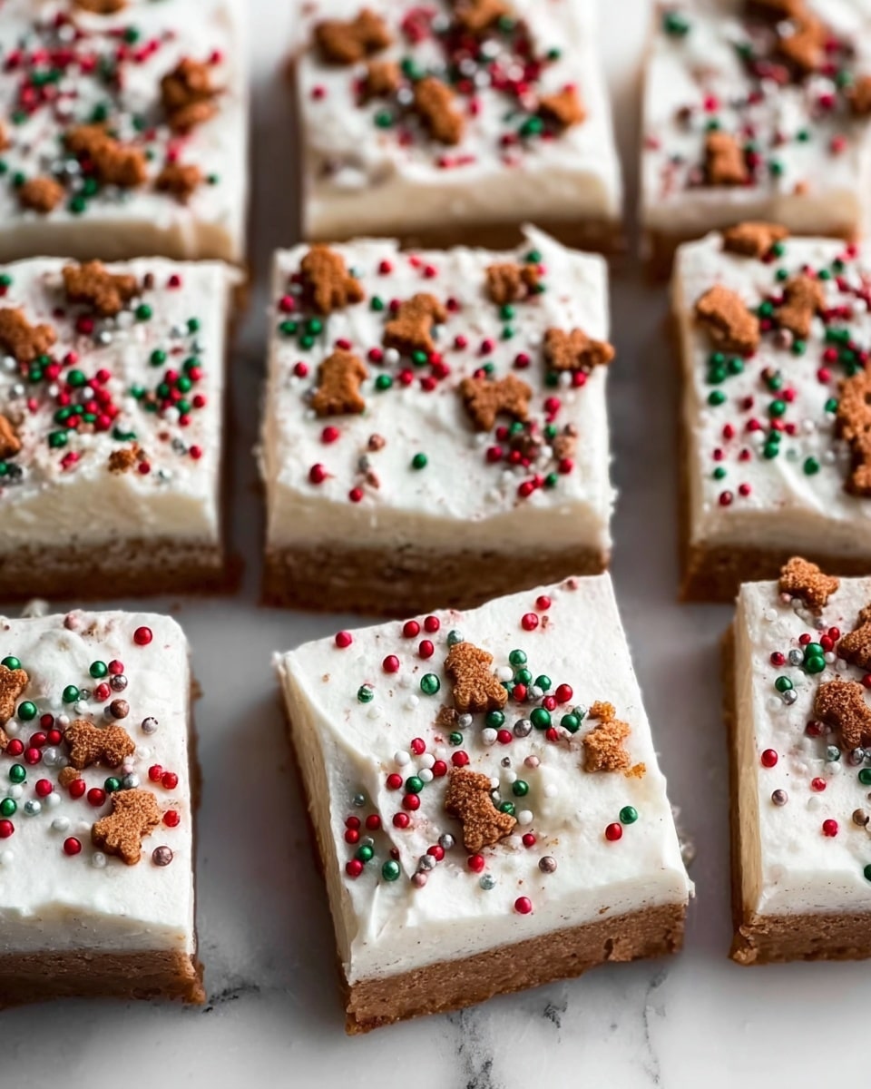 The image shows several square pieces of a dessert, each with two clear layers. The bottom layer is light brown with a smooth texture, looking like a baked base. The top layer is thick white cream spread evenly, topped with small red, green, and white round sprinkles, along with small brown cookie shapes that look like little figures scattered over the cream. The dessert pieces are placed close together on a white marbled surface. photo taken with an iphone --ar 4:5 --v 7