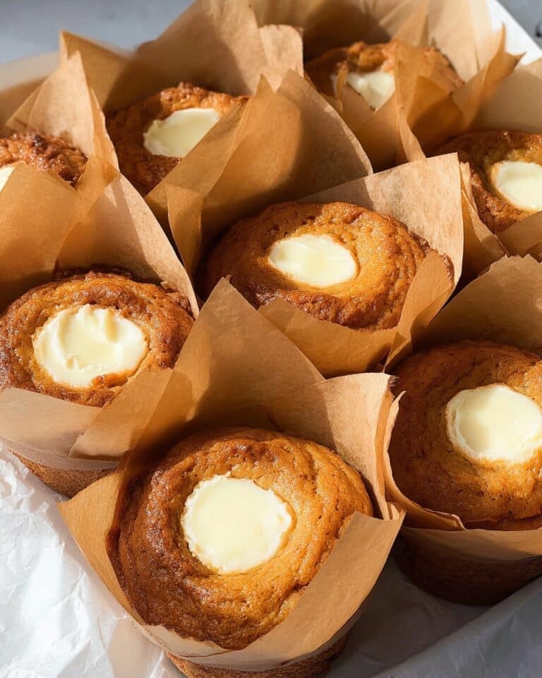 Pumpkin Muffins with Cream Cheese Filling and Pumpkin Seeds Recipe