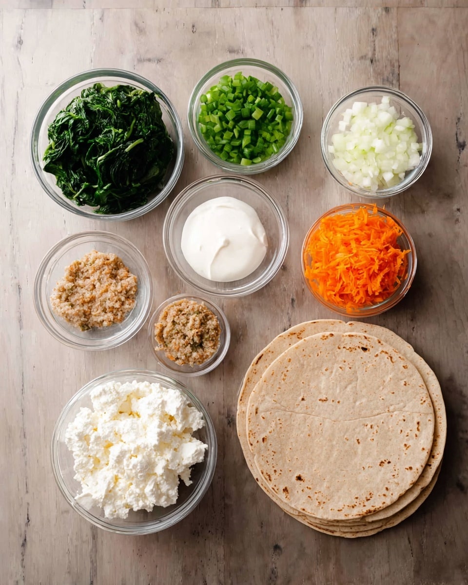 On a white marbled surface, there is a neat arrangement of ingredients in small clear glass bowls and a stack of round wheat tortillas on the right side. Starting from the top left, a bowl of dark green chopped spinach, followed by a bowl of white chopped onions, a bowl of bright green chopped spring onions, and a bowl of creamy white sour cream. Below these, there is a bowl of white cottage cheese, a small bowl of light brown ground mixture, a bowl of orange grated carrot, and a bowl of thick white cream. The stack of about five tortillas is light brown with slight texture and rests flat on the surface. The overall look is clean and organized. Photo taken with an iphone --ar 4:5 --v 7