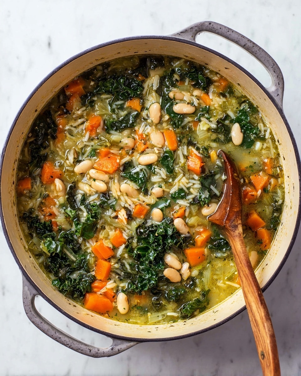 A large round white pot filled with a thick vegetable and bean stew showing distinct layers of orange carrot chunks, dark green kale leaves, white beans, and mixed white and wild rice submerged in a light greenish broth, with a wooden spoon resting inside the pot on the right side; the pot is placed on a white marbled surface photo taken with an iphone --ar 4:5 --v 7