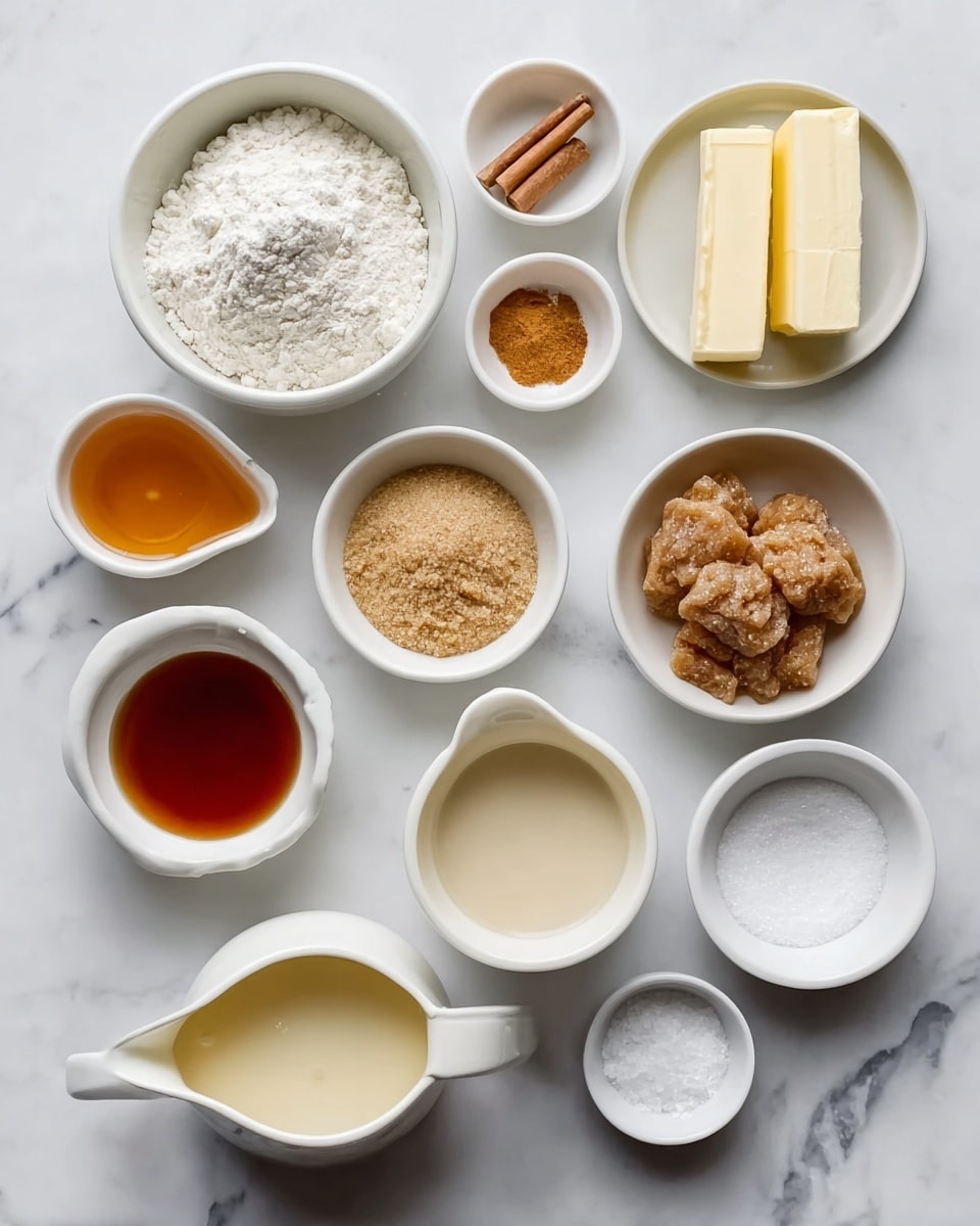 The image shows eleven white bowls and small white pitchers arranged neatly on a white marbled surface. Starting from the top left, there is a bowl filled with white flour, next to it is a small bowl with two spices, one cinnamon-colored and the other orange. To the right is a bowl with three pale yellow sticks of butter. Below the flour bowl, there is a small pitcher with a light yellow liquid. Next to it is a small bowl with a reddish-brown liquid, and below that is a small white bowl with a light brown powder. Moving down, there is a pitcher filled with pale cream color liquid, next to it a bowl with a chunkier brown sugar mix, and below that a bowl of white powder. At the bottom left, there is a pitcher full of amber-colored syrup or jam, and two small bowls near the bottom right filled with white granules and coarse salt. All containers have smooth textures and are placed on a clean white marbled surface. photo taken with an iphone --ar 4:5 --v 7