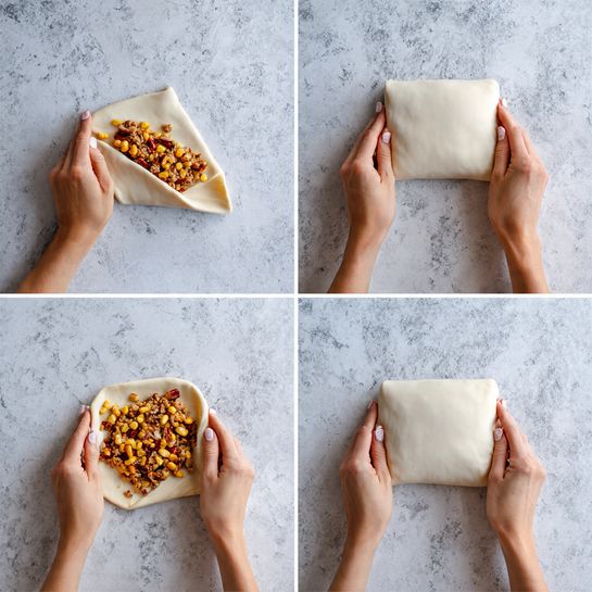 The image shows four steps of wrapping a square piece of soft, thin white dough around a colorful filling. The filling, placed in the center, is a mix of small pieces of red peppers, brown beans, yellow corn, and shredded light-colored chicken, creating a mix of red, brown, yellow, and light beige colors. In the second step, a woman's hand with light-colored nail polish lifts one corner of the dough to fold it over the filling. In the third step, another woman's hand folds two opposite corners inward over the filling, partially covering the filling. Finally, in the fourth step, a woman's hand finishes rolling the dough into a tight, smooth cylindrical shape, fully enclosing the filling. The work surface has a dull grey texture replaced with a white marbled texture. photo taken with an iphone --ar 4:5 --v 7