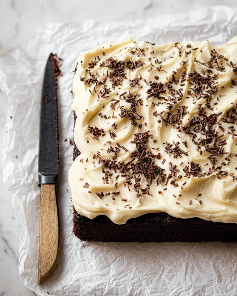 Cream Cake with Irish Cream Frosting and Chocolate Shavings Recipe