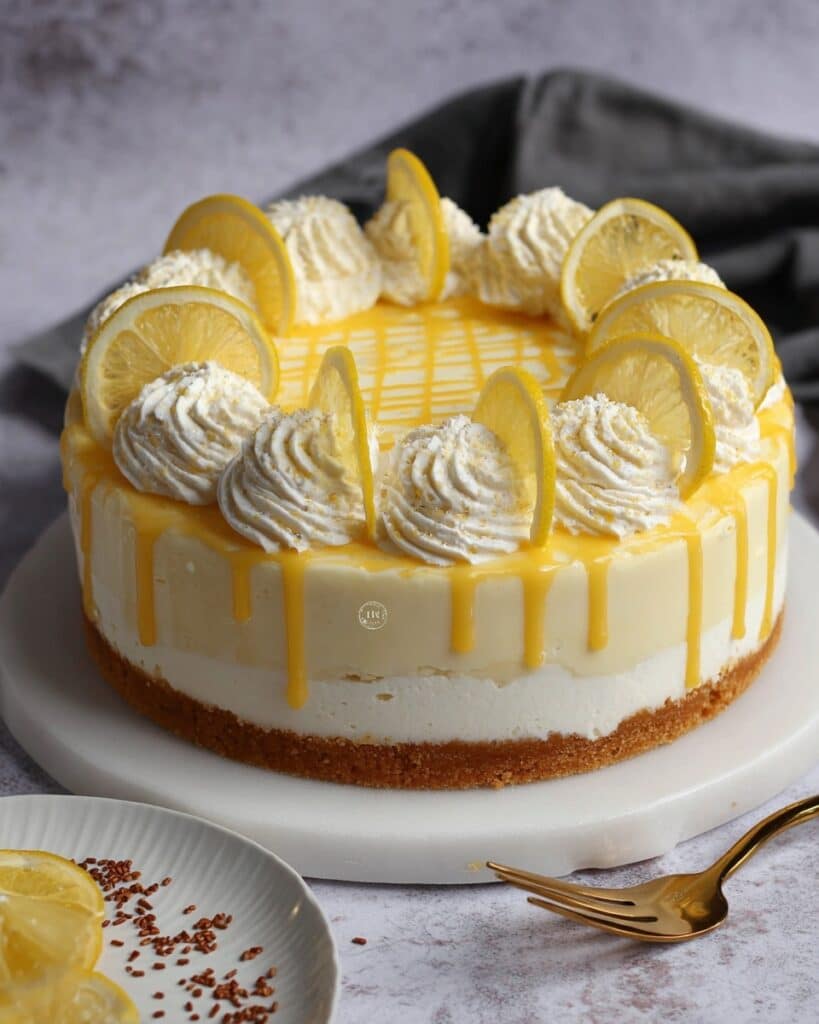 Drizzle Lemon Cake with Lemon Cheesecake Frosting and White Chocolate Decoration Recipe