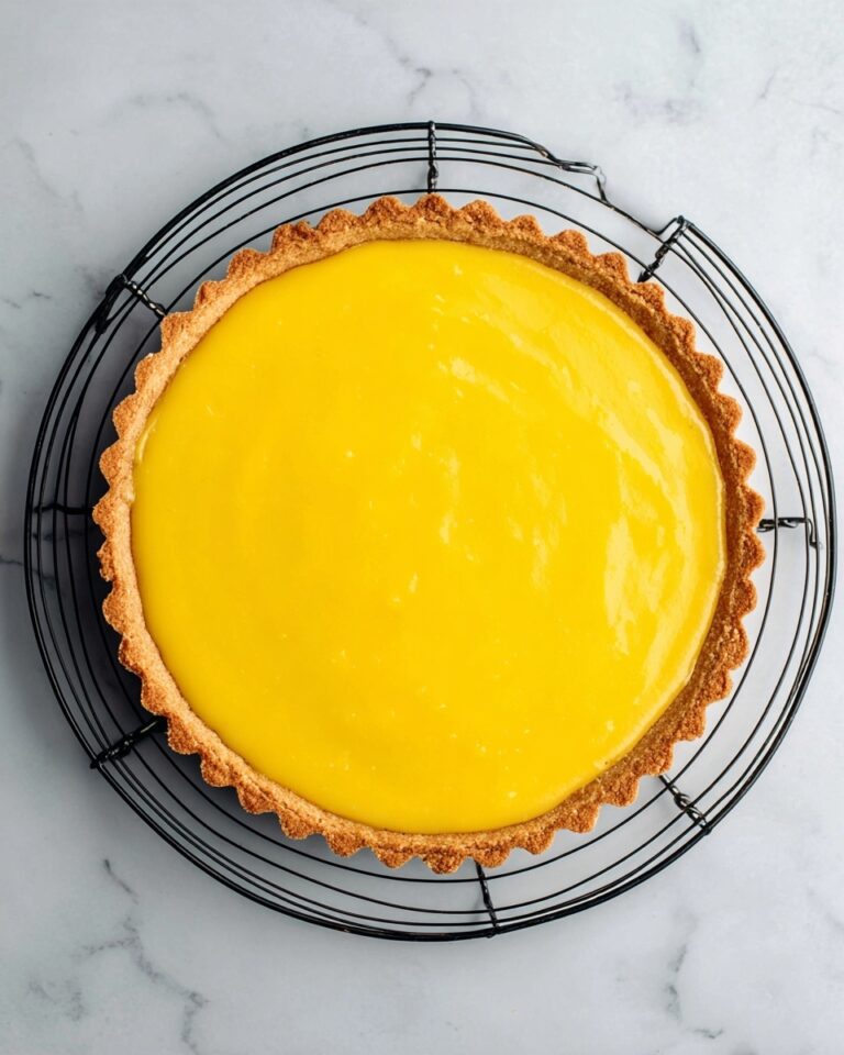 Mango Curd Tart with Coconut Crust and Fresh Raspberries Recipe
